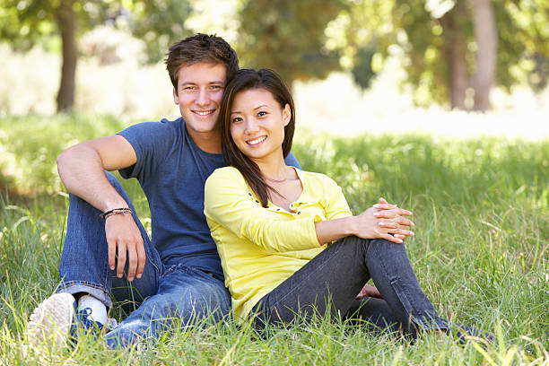 istock Young Couple Relaxing In Countryside 175490725