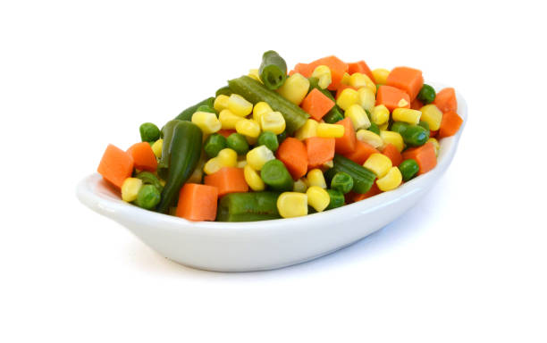 istock Fresh mixed vegetables on white. Golden mix. 1754920087