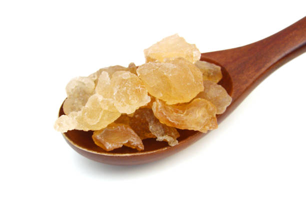 istock Brown sugar cubes isolated on white background 1754920642