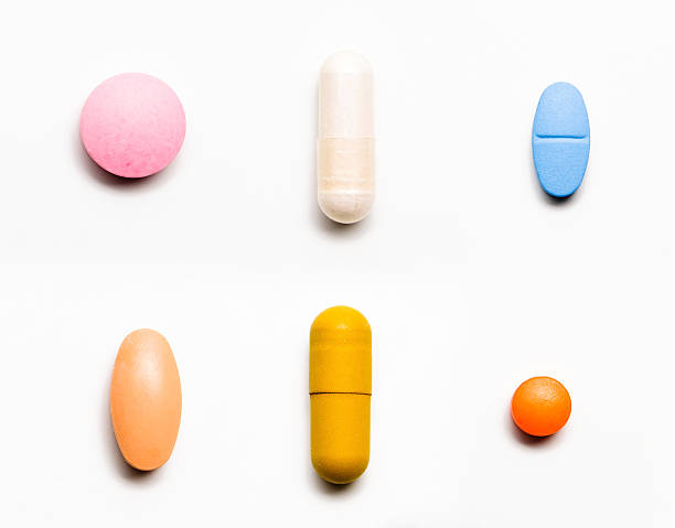 медицина - painkiller pill capsule birth control pill стоковые фото и изображения
