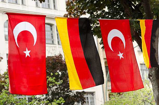 Flags of Germany and Turkey hanging outside on a street in Kreuzberg, Berlin.
