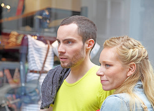 istock couple in there 20's window shopping 175492593