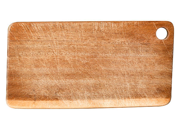 istock Wooden used chopping board isolated on white background, copy space 175492695