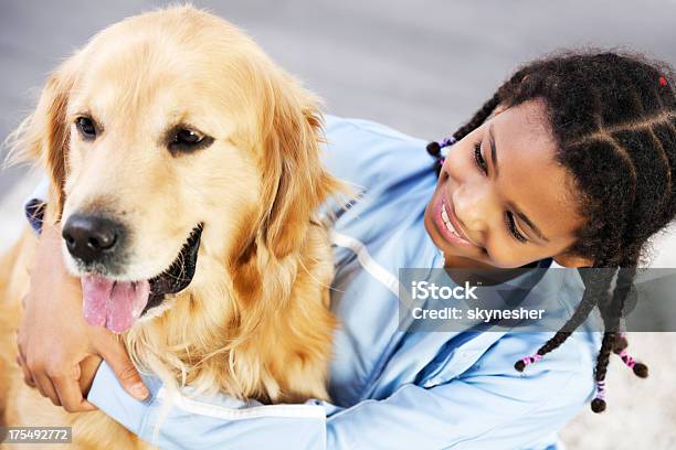 Girl With Her Dog Stock Photo - Download Image Now - Child, Dog, African Ethnicity