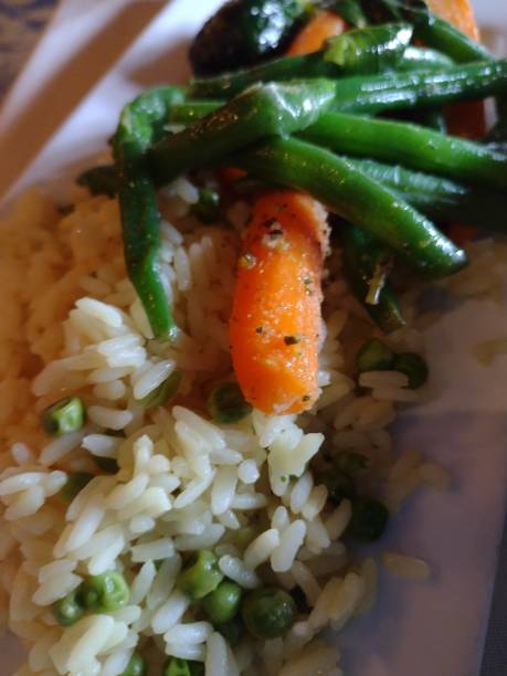 istock rice, peas, green beans and carrots 1754928096