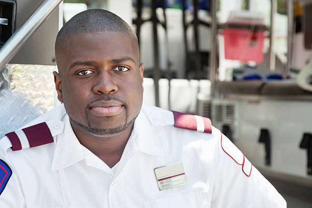 istock Confident paramedic sitting on back of ambulance 175492841
