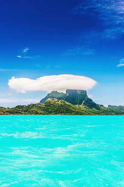 "Bora Bora. View over beautiful turquoise lagoon to volcanic Mount Otemanu, Bora Bora Island, Society Islands, French Polynesia."