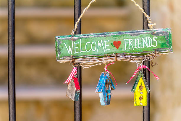 Home welcoming sign on the fence