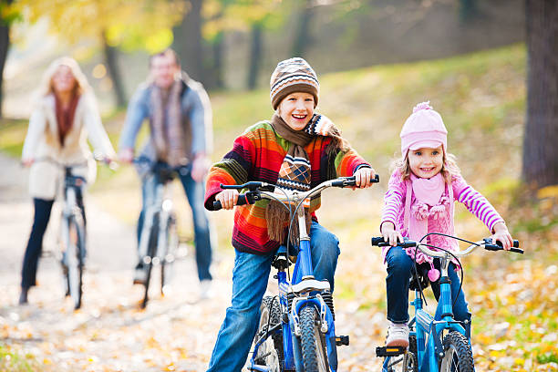 istock Happy family riding bicycles in nature. 175493710