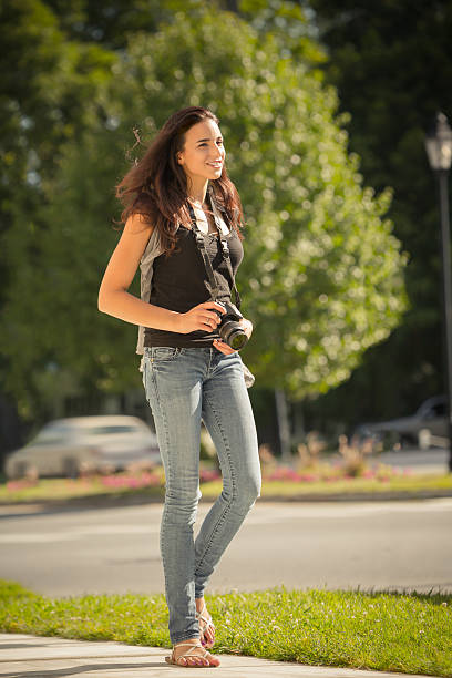 istock Happy Young Photographer Full Length 175493866