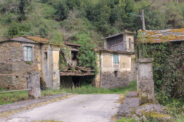 istock a group of old , abandoned houses 1754941116