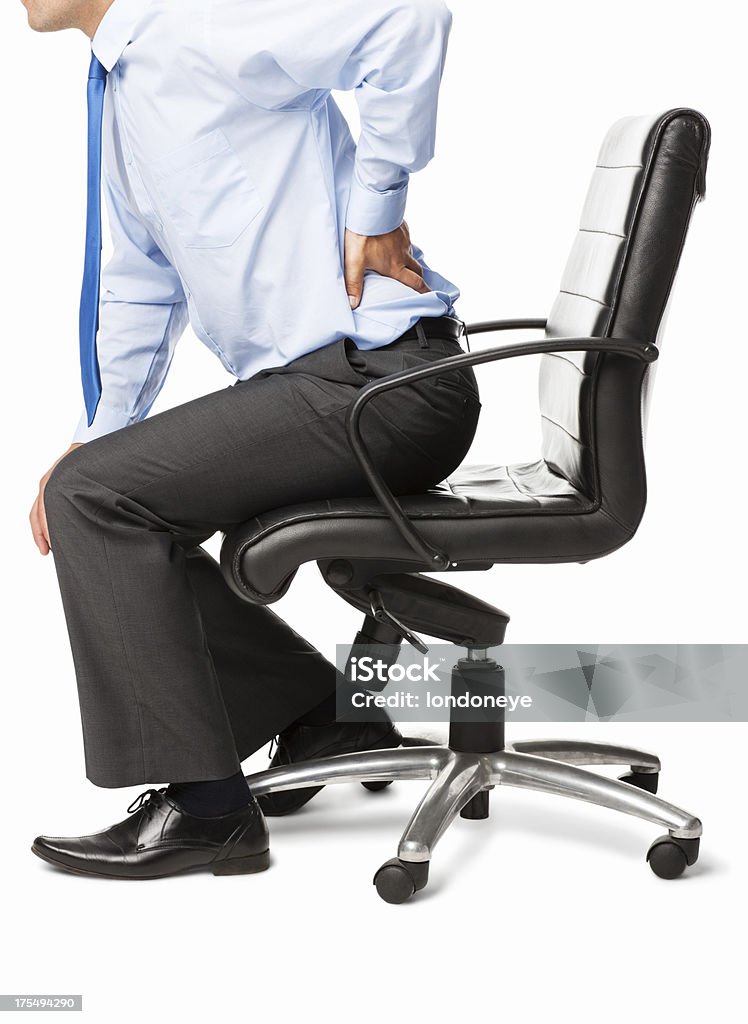 Executivo masculino com dor de costas-isolada - Royalty-free Cadeira Foto de stock