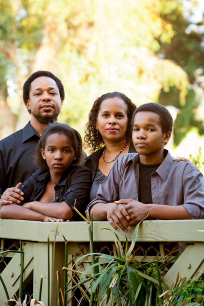 Portrait of an ethnic family outdoors.