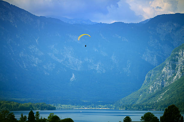 istock Parachute tandem flying over Lake Bohinj 175495063