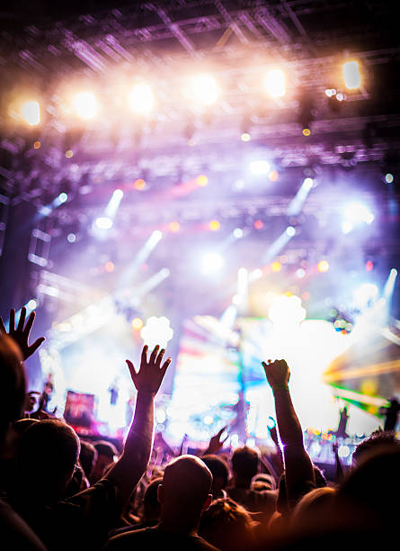 istock Young people at a party dancing with their hands up 175495202