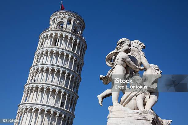 Leaning Tower Of Pisa With Statue Of Cherubs Pisa Italy Stock Photo - Download Image Now