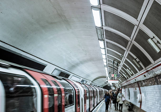 istock Train and people in subway station, London 175495678
