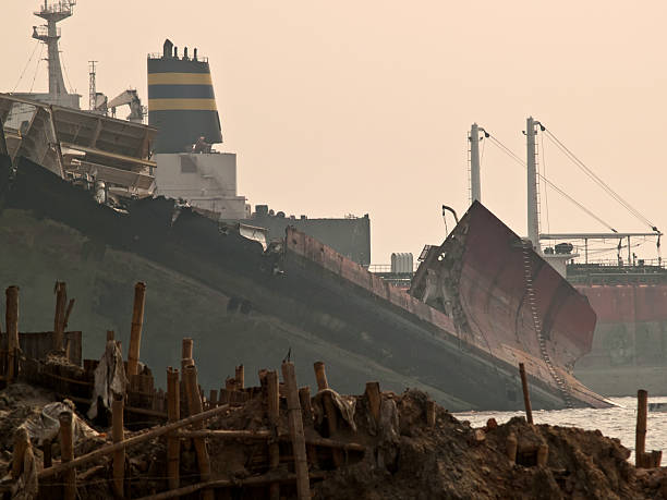 Ship breaking yards of Bangladesh through the foggy and toxic atmosphere.Along the southeast coast of Bangladesh is the Chittagong - Sitakunda ship breaking yard where immense ocean freighters and tankers are torn apart.