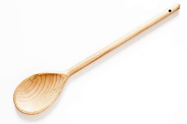 Wooden Spoon on White Background Wooden spoon on white background wooden spoon stock pictures, royalty-free photos & images