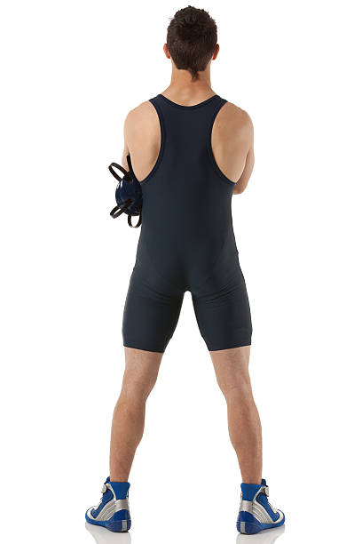 istock Rear view of a male wrestler standing 175497526