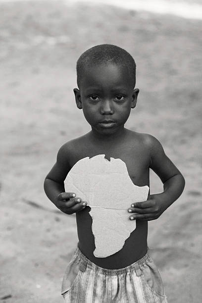 istock African Boy with Africa Cut-Out 175497842