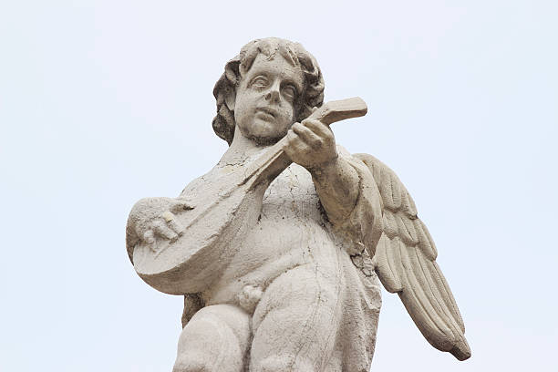 istock ancient white guitar playing angel statue on Zadar Croatia church 175498733
