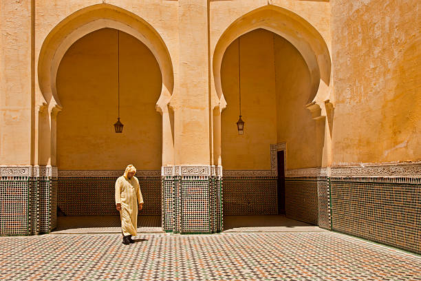 Morocco - Tomb of Moulay Ismail Yellow wall with traditional arc, Morocco, Meknes. Tomb of Moulay Ismail. meknes stock pictures, royalty-free photos & images