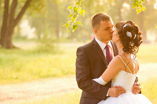 istock Newlyweds kissing 175499025