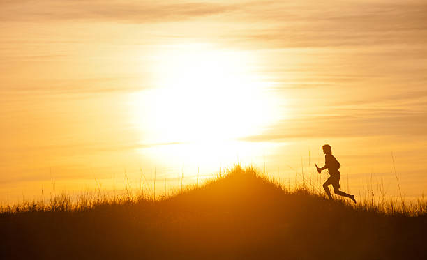 istock Male runner out for a training run at sunset 175499550
