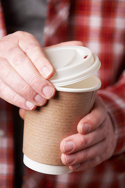 istock Man Holding Cup Of Takeaway Coffee 175499732
