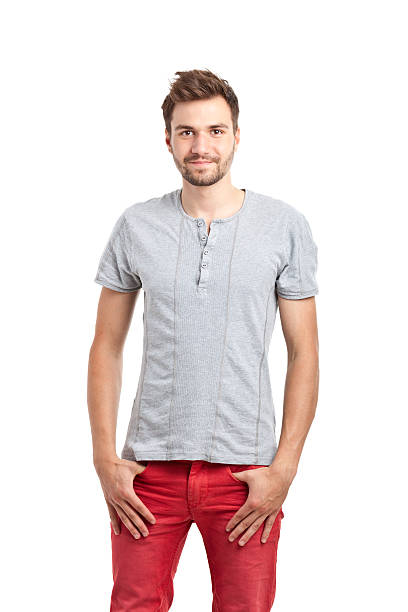 istock young handsome man in grey tshirt and red trousers 175499882