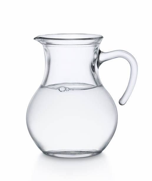 water in jug jug of water isolated on white background jug stock pictures, royalty-free photos & images