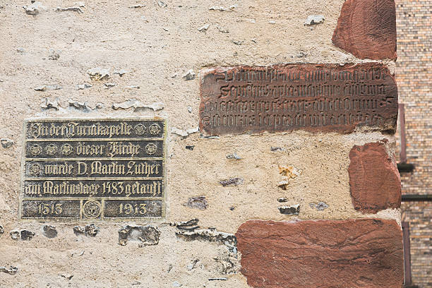 Memorial plaque of Martin Luthers baptism in 1483 at St. Petri-Pauli church in Eisleben (Germany)see also: