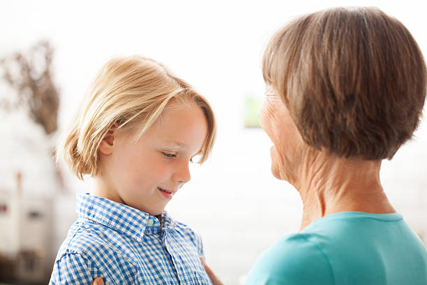 Grandmother with grandson Grandmother with grandson grandmother real people front view head and shoulders stock pictures, royalty-free photos & images