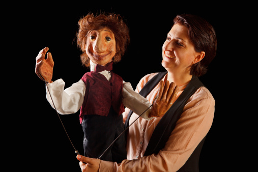 Puppeteer with her Rod Puppet, 