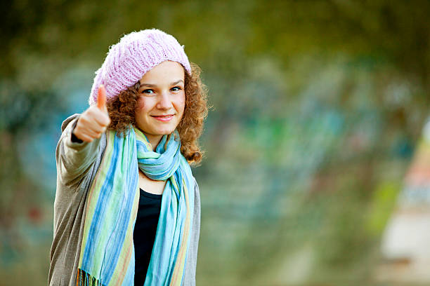 istock teenager showing thumbs up 175501369