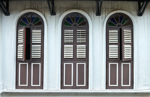 Sino-Portuguese Architecture vintage wooden windows. Heritage houses in George Town