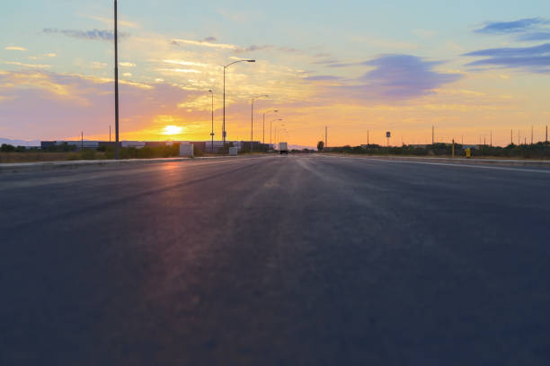istock highway road at sunset in the city 1755016465