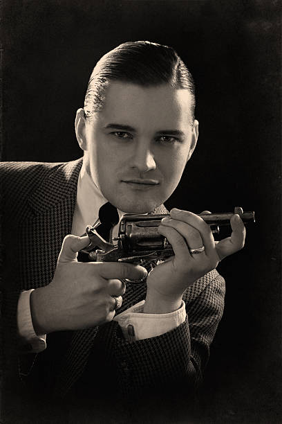 istock Film Noir style.Man with the gun 175501785