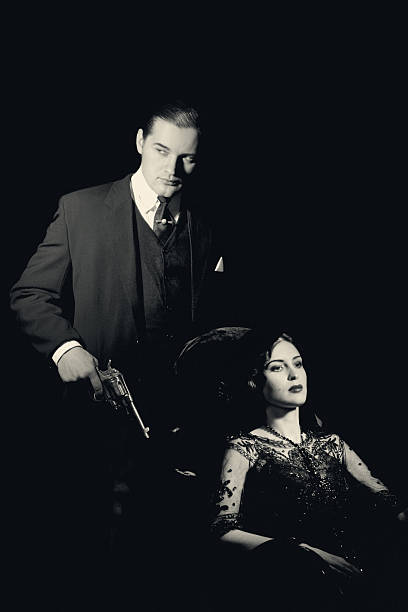 istock Film Noir style. Dangerous couple 175501786