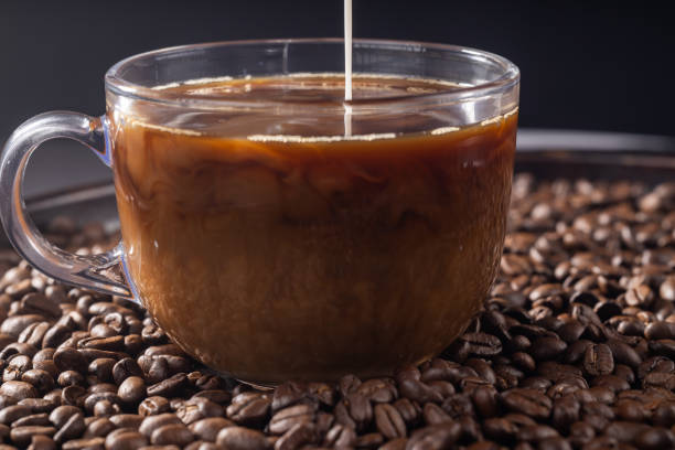 istock Cup of coffee and coffee beans 1755018590