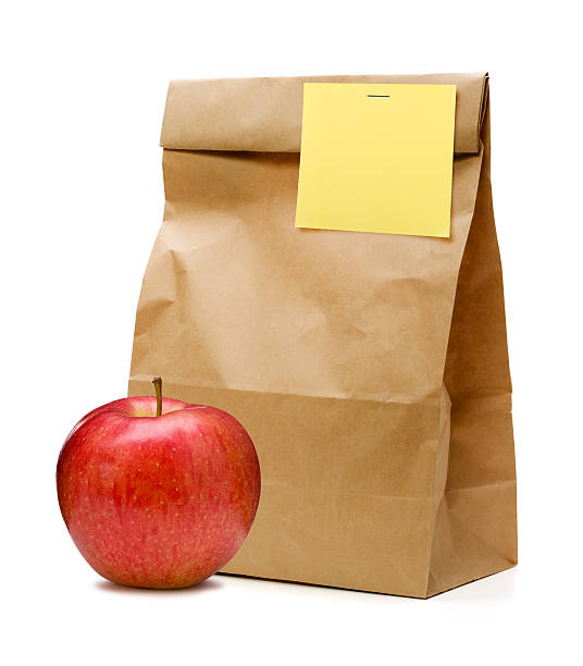обед - lunch bag apple brown стоковые фото и изображения
