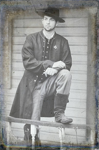 Soldier of the American Civil War, Union Infantry Private "Soldier standing for portrait, American Civil War infantry private, black and white modern image with processing to create vintage retro period look." civil war photos stock pictures, royalty-free photos & images