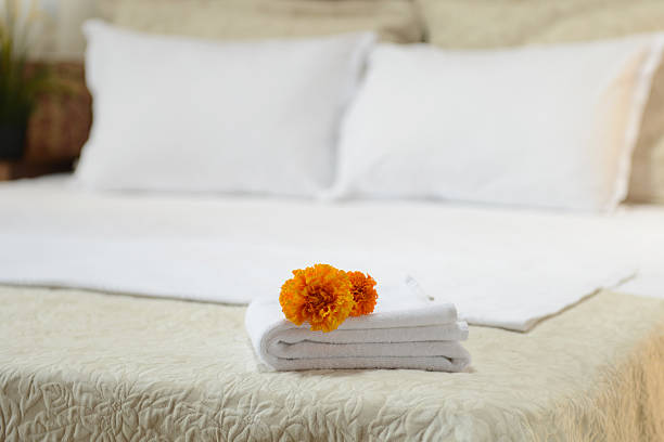 hotel room towels stock photo