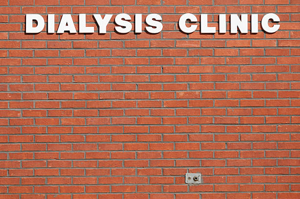 istock Dialysis clinic sign on brick wall 175503437