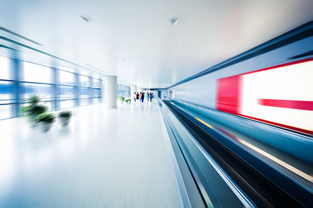 istock people walking in airport corridor with blur 175503543