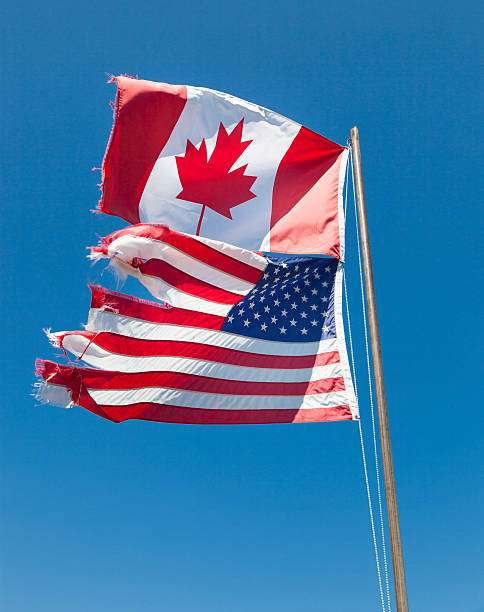 istock Old Canadian and American flags 175503586