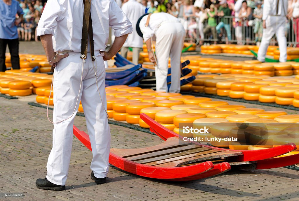 Cheese carriers in Alkmaar Cheese carries in Alkmaar cheese market Gouda Cheese Stock Photo