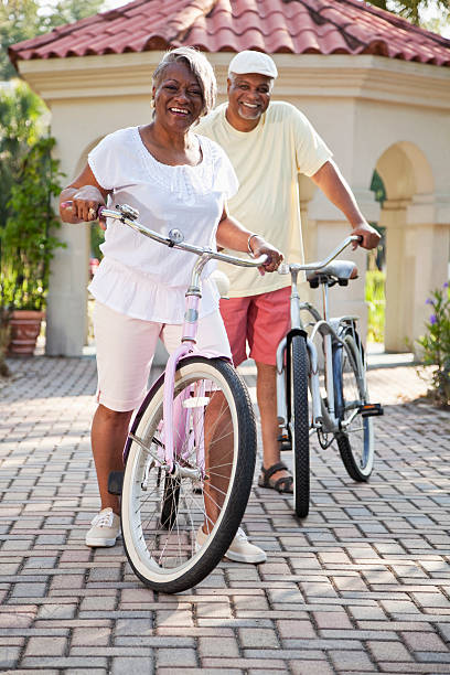 istock Senior African American couple riding bicycles 175504056