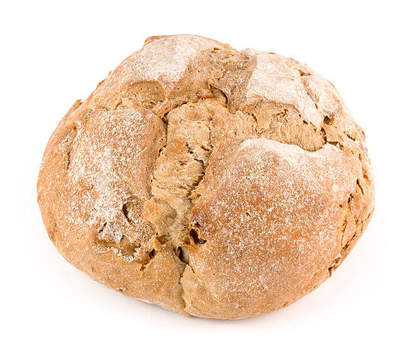 istock Round loaf of walnut bread on a white background 175504208